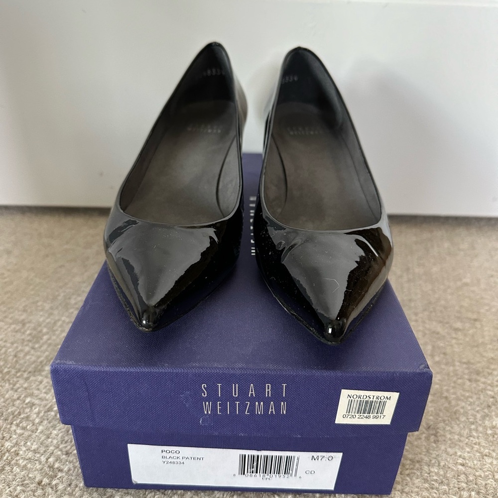 Stuart Weitzman black patent kitten heels. S 7